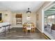 Cozy dining room with stylish decor and backyard access, ideal for entertaining guests at 8502 E Rose Ln, Scottsdale, AZ 85250