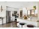 Modern kitchen boasts stainless steel appliances, granite countertops, and ample cabinet space at 8502 E Rose Ln, Scottsdale, AZ 85250