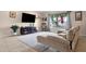 Cozy living room with stylish furniture, neutral color palette and lots of natural light at 8644 E Roanoke Ave, Scottsdale, AZ 85257