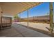 Spacious backyard patio area perfect for outdoor relaxation, with a well-kept yard at 9710 E Baywood Ave, Mesa, AZ 85208