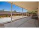 Spacious backyard patio area perfect for outdoor relaxation, with a well-kept yard at 9710 E Baywood Ave, Mesa, AZ 85208