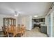 Spacious kitchen and dining area with dark cabinets and modern appliances at 9710 N 55Th Ave, Glendale, AZ 85302