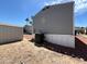 The backyard features a storage shed, an air conditioning unit, and desert landscaping at 1002 W Kachina Trl, Phoenix, AZ 85041