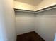 Walk-in closet with ample storage and carpet flooring at 1002 W Kachina Trl, Phoenix, AZ 85041