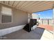 Mobile home featuring a covered entrance, dark wood stairs and a white door at 1002 W Kachina Trl, Phoenix, AZ 85041