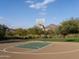 Outdoor basketball court featuring a hoop and well-maintained playing surface, set against a scenic mountain backdrop at 10527 E Acacia Dr, Scottsdale, AZ 85255