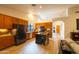 Eat-in kitchen with stainless appliances, center island and wooden cabinets at 10527 E Acacia Dr, Scottsdale, AZ 85255