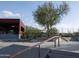 Modern skate park with ramps, rails, and smooth concrete surfaces, providing a fun space for skateboarders at 10527 E Acacia Dr, Scottsdale, AZ 85255