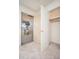 Entryway features plush carpet, front door, closet, and great natural light at 10860 W Cheryl Dr, Sun City, AZ 85351