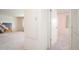 Hallway with carpet and white doors at 10860 W Cheryl Dr, Sun City, AZ 85351