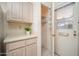 Walk in pantry in the kitchen with storage at 10860 W Cheryl Dr, Sun City, AZ 85351