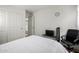 Bedroom featuring white walls, carpeted floors and an adjacent bathroom at 1116 S 53Rd St, Mesa, AZ 85206