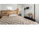 Bedroom with a brown and white chevron bedspread at 1116 S 53Rd St, Mesa, AZ 85206