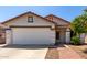 Front exterior showcasing the home's architectural details and well-maintained landscaping at 1116 S 53Rd St, Mesa, AZ 85206