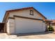Attached two-car garage offering convenient parking and additional storage space at 1116 S 53Rd St, Mesa, AZ 85206