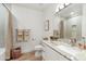 Well-lit bathroom with a granite countertop vanity and tub-shower combination, offering a clean and functional space at 11500 E Cochise Dr # 1015, Scottsdale, AZ 85259