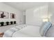 Serene bedroom with soft bedding, neutral tones, and artwork, creating a peaceful retreat at 11500 E Cochise Dr # 1015, Scottsdale, AZ 85259