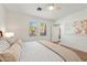 Bright bedroom features a comfortable bed and windows offering natural light, creating a relaxing atmosphere at 11500 E Cochise Dr # 1015, Scottsdale, AZ 85259
