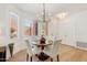 Cozy dining room featuring a round table, comfortable seating, and natural light at 11500 E Cochise Dr # 1015, Scottsdale, AZ 85259