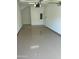Clean, empty garage with sealed floor ready to store your vehicles and belongings at 11500 E Cochise Dr # 1015, Scottsdale, AZ 85259