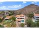 Scenic aerial view showcasing a pool and outdoor gazebo, set against a beautiful desert backdrop at 1221 E Claire Dr, Phoenix, AZ 85022