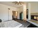 Main bedroom showcasing a fireplace, hardwood floors, and ensuite bathroom at 1221 E Claire Dr, Phoenix, AZ 85022