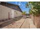 The exterior of a home with a view of a backyard patio area and landscape at 1225 E Jacob Ln, Phoenix, AZ 85020