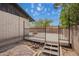 Backyard patio area with access steps leading to a home's exterior at 1225 E Jacob Ln, Phoenix, AZ 85020