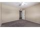 Bedroom featuring carpet, a ceiling fan, and light colored walls at 1225 E Jacob Ln, Phoenix, AZ 85020