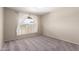 Bedroom featuring carpet, a ceiling fan, and a window at 1225 E Jacob Ln, Phoenix, AZ 85020