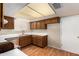 Kitchen with bright, overhead lighting, stainless steel appliances, and sleek countertops at 1225 E Jacob Ln, Phoenix, AZ 85020