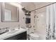 Full bathroom including shower-tub combo and a nice vanity space at 12913 W Columbine Dr, El Mirage, AZ 85335