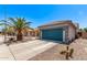 Home with a two-car garage, tidy landscaping, and a cozy path leading to the front entrance at 12913 W Columbine Dr, El Mirage, AZ 85335
