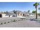 Striking one-story home with manicured desert landscaping and a driveway, ideal for sophisticated living at 13365 N 74Th St, Scottsdale, AZ 85260