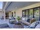 Elegant covered patio with comfortable seating, perfect for outdoor relaxation and entertaining guests at 13365 N 74Th St, Scottsdale, AZ 85260