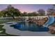 Beautiful backyard with pool, hot tub, artificial lawn and mature trees and landscaping at 13365 N 74Th St, Scottsdale, AZ 85260