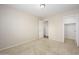 An additional bedroom offers closet space and a window for natural light at 14237 W Aster Dr, Surprise, AZ 85379