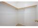 This basic closet offers a blank canvas for customization at 14237 W Aster Dr, Surprise, AZ 85379
