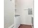 Bright laundry room with a newer washing machine and dryer with white shutter doors at 14575 W Mountain View Blvd # 12107, Surprise, AZ 85374