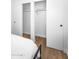 Modern closet showcasing sliding doors with ample storage, rod, and shelves for organized living at 14635 N 37Th Pl, Phoenix, AZ 85032