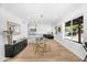 Bright dining area featuring modern decor and a clear view into the updated kitchen at 14635 N 37Th Pl, Phoenix, AZ 85032