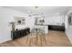 Elegant dining area with modern chandelier and decorative mirror at 14635 N 37Th Pl, Phoenix, AZ 85032