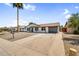 Single-story house featuring a well-maintained exterior, low-maintenance front yard, and attached garage at 14635 N 37Th Pl, Phoenix, AZ 85032