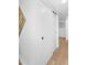 This modern hallway features minimalist decor and a sleek sliding door design at 14635 N 37Th Pl, Phoenix, AZ 85032