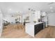 Open floor plan showcasing the modern kitchen, dining area, and living space at 14635 N 37Th Pl, Phoenix, AZ 85032
