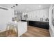 Modern kitchen features a breakfast bar and stainless steel appliances at 14635 N 37Th Pl, Phoenix, AZ 85032