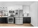 This modern kitchen boasts stainless steel appliances and stylish two-tone cabinetry at 14635 N 37Th Pl, Phoenix, AZ 85032