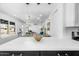 Open concept kitchen with a large island and views of the adjacent living room at 14635 N 37Th Pl, Phoenix, AZ 85032