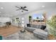 Spacious open-concept living and dining area with ample natural light and stylish furnishings, ideal for modern living at 14635 N 37Th Pl, Phoenix, AZ 85032