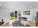 Well-lit office space with sliding glass doors to the backyard at 14635 N 37Th Pl, Phoenix, AZ 85032